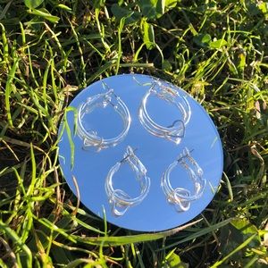 Pack of two shiny hoop earrings with heart charms